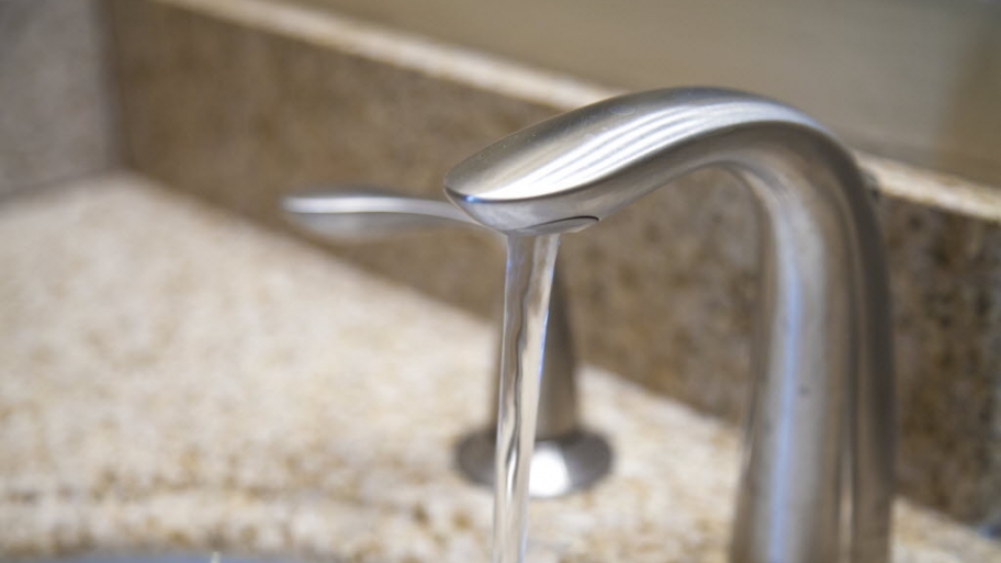 Water faucet running